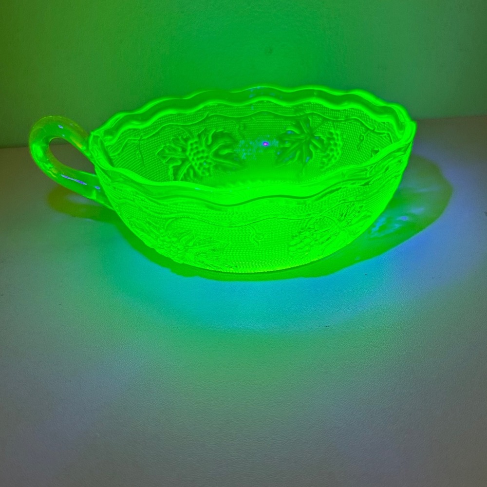 Westmoreland Stippled Grape Uranium Glass Nappy Bowl Single Handle Green UV Glow